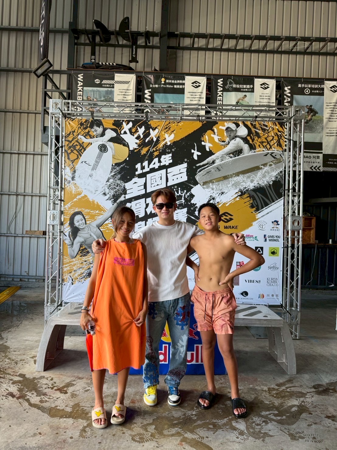 Jessica with dad and younger brother at wakeboard event